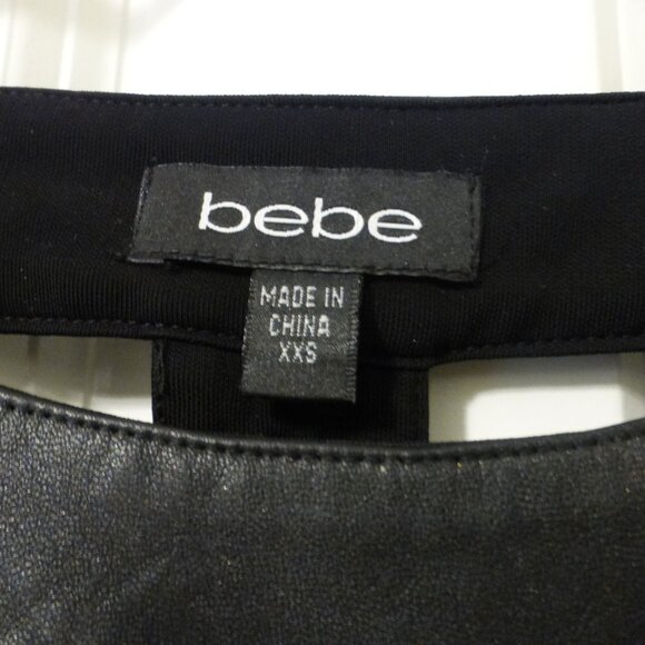 BEBE Black T-back mini dress with faux leather belt and trim - Picture 9 of 12